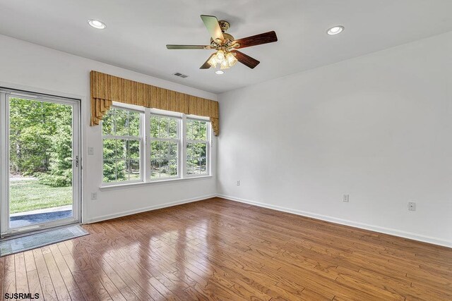 317 Southmoor Dr, Galloway Township, NJ 08205 - unfurnished room featuring a ceiling fan, baseboards, healthy amount of natural light, wood finished floors, and recessed lighting