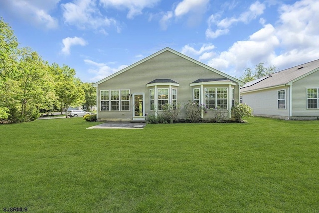 317 Southmoor Dr, Galloway Township, NJ 08205 - rear view of house featuring a yard and a patio area