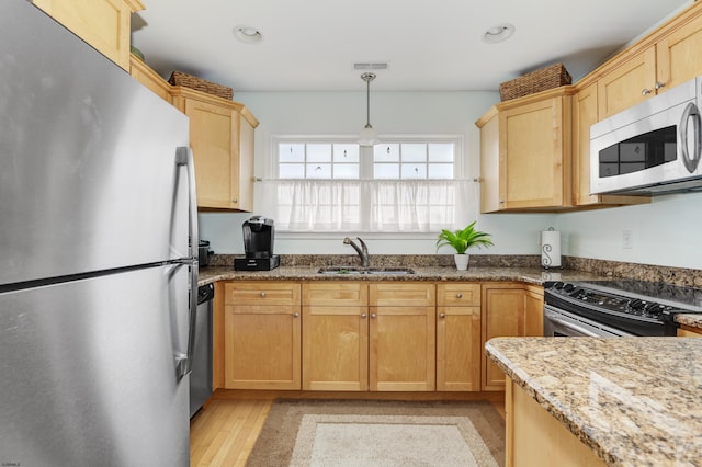 818 Aldrich Rd Fl 2Nd, Ocean City, NJ 08226 - kitchen with stainless steel appliances, a sink, light stone countertops, decorative light fixtures, and recessed lighting