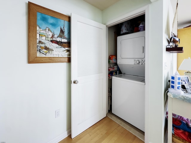 818 Aldrich Rd Fl 2Nd, Ocean City, NJ 08226 - clothes washing area with estacked washer and dryer and light wood finished floors