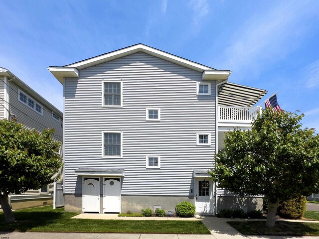 818 Aldrich Rd Fl 2Nd, Ocean City, NJ 08226 - rear view of house featuring a balcony