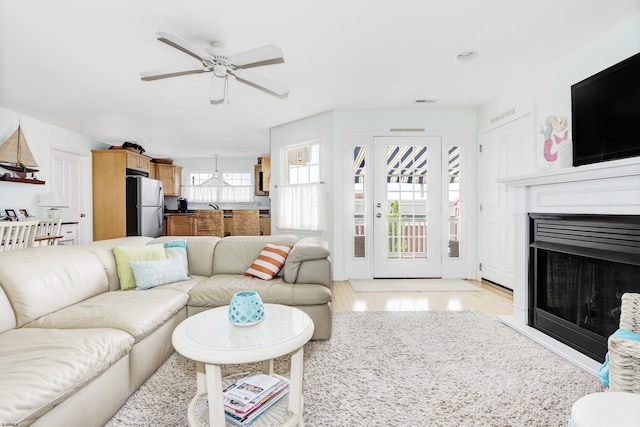 818 Aldrich Rd Fl 2Nd, Ocean City, NJ 08226 - living area with a ceiling fan, a fireplace, and light wood-type flooring