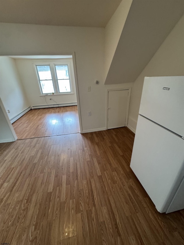 2015 Grant Ave, Atlantic City, NJ 08401 - additional living space featuring a baseboard heating unit, wood finished floors, and baseboards