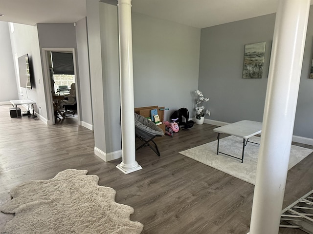 127 Rockport, Egg Harbor Township, NJ 08234 - living room with decorative columns, baseboards, and wood finished floors