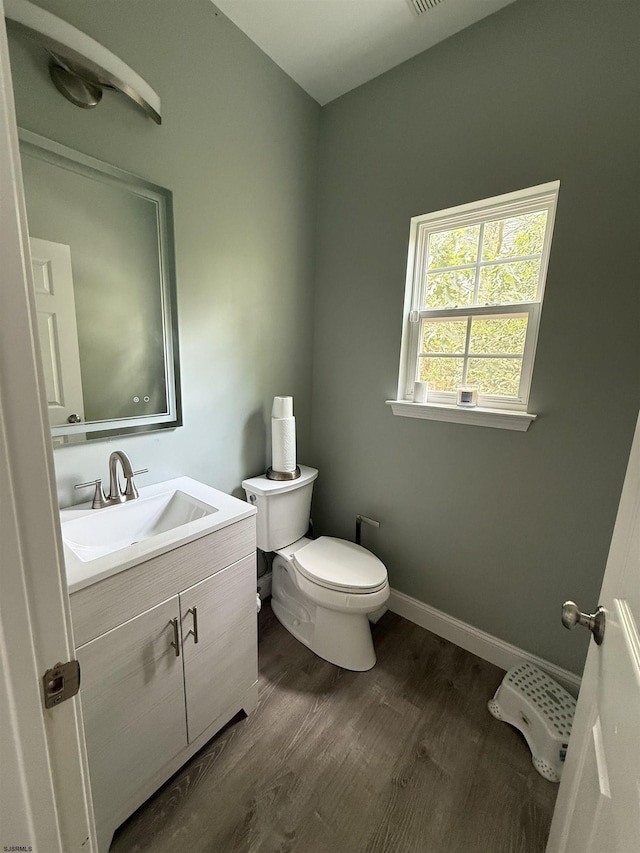 127 Rockport, Egg Harbor Township, NJ 08234 - bathroom featuring vanity, toilet, wood finished floors, and baseboards