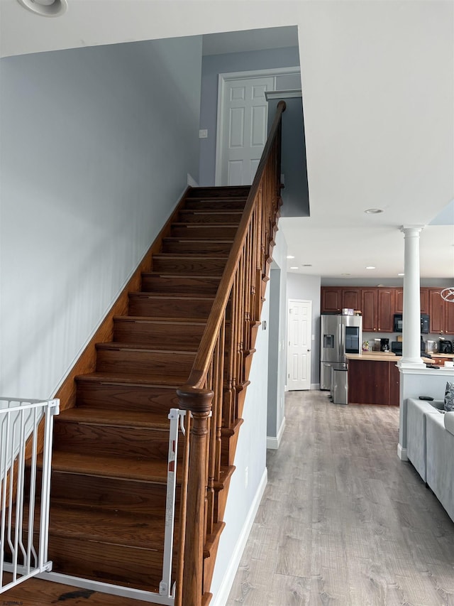 127 Rockport, Egg Harbor Township, NJ 08234 - stairway featuring wood finished floors, decorative columns, recessed lighting, and baseboards
