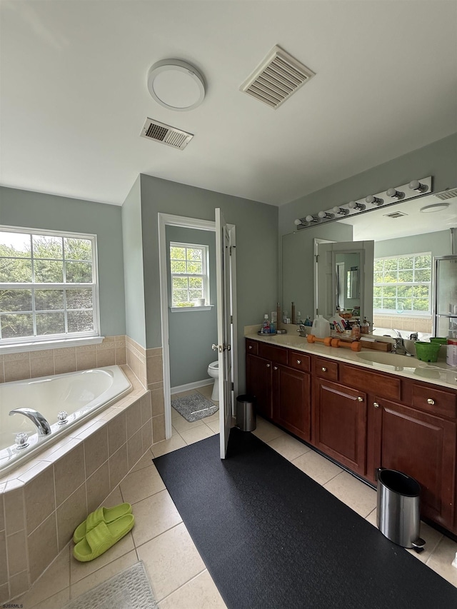 127 Rockport, Egg Harbor Township, NJ 08234 - bathroom featuring tile patterned flooring, toilet, double vanity, and a bath