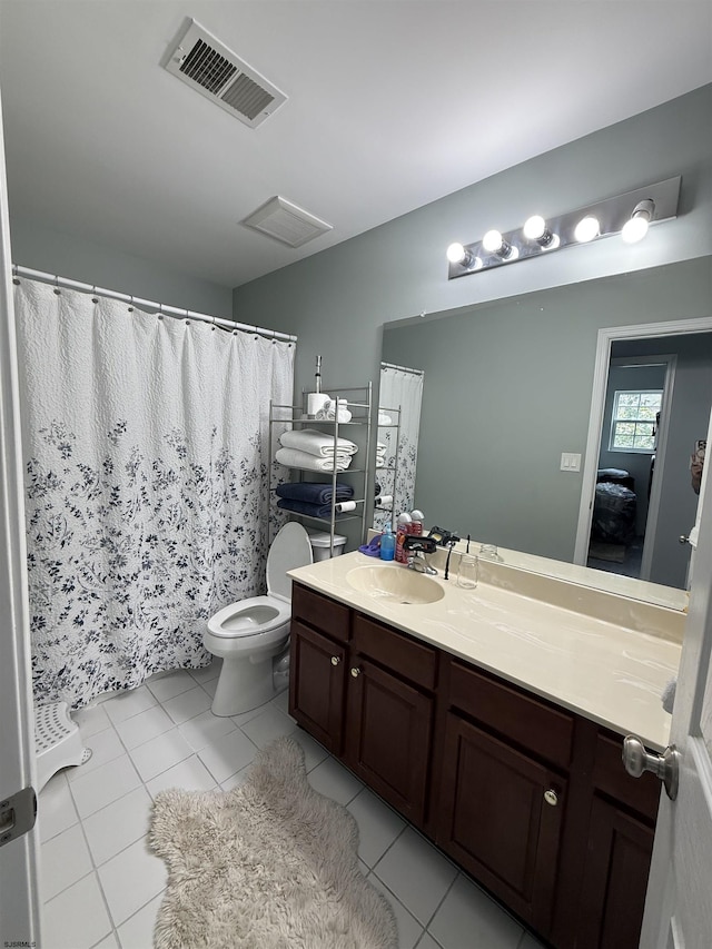 127 Rockport, Egg Harbor Township, NJ 08234 - bathroom featuring vanity, tile patterned flooring, and toilet