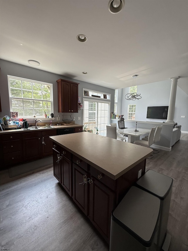 127 Rockport, Egg Harbor Township, NJ 08234 - kitchen with a center island, light wood-type flooring, a kitchen breakfast bar, a sink, and open floor plan
