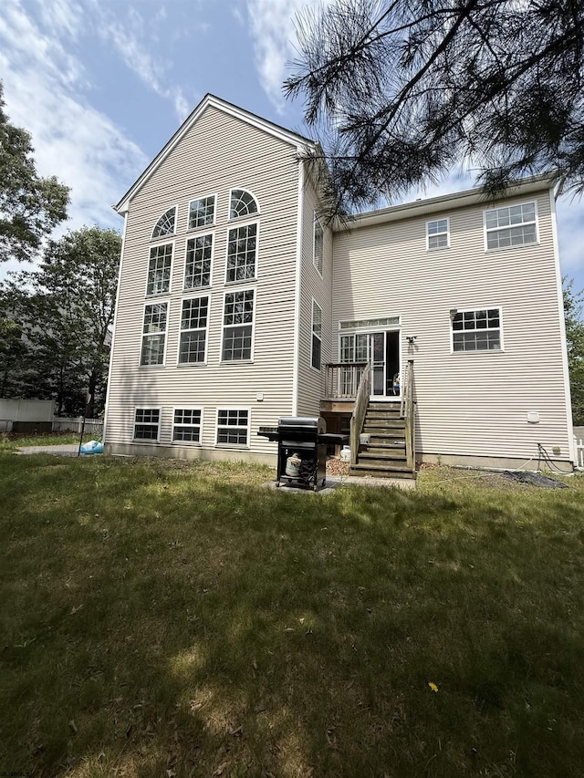 127 Rockport, Egg Harbor Township, NJ 08234 - back of property featuring a yard and a wooden deck
