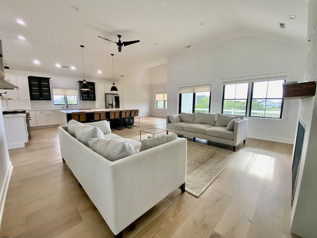 116 Bayshore Ave, Brigantine, NJ 08203 - living area featuring a ceiling fan, light wood-type flooring, high vaulted ceiling, recessed lighting, and baseboards