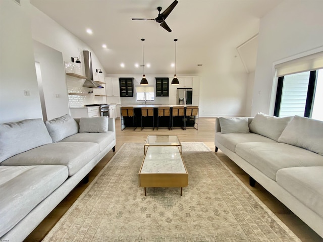 116 Bayshore Ave, Brigantine, NJ 08203 - living room featuring ceiling fan, plenty of natural light, recessed lighting, light wood-type flooring, and vaulted ceiling