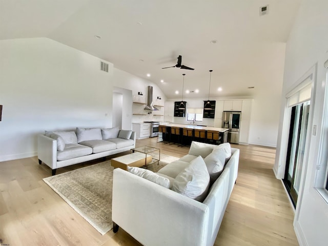116 Bayshore Ave, Brigantine, NJ 08203 - living area featuring ceiling fan, light wood-style floors, recessed lighting, high vaulted ceiling, and baseboards