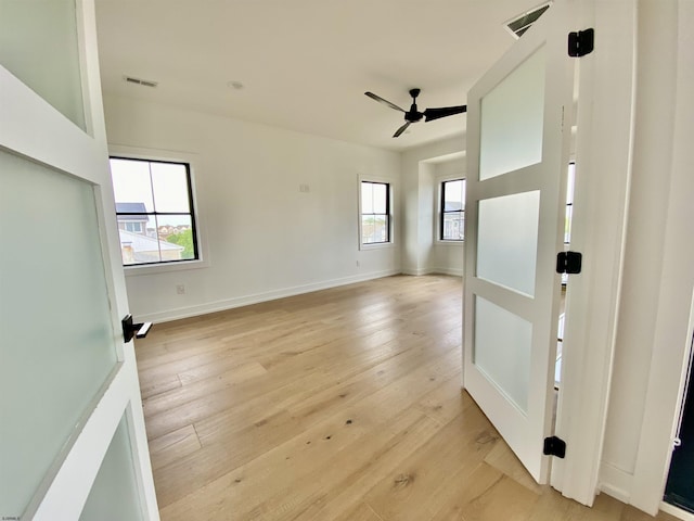 116 Bayshore Ave, Brigantine, NJ 08203 - spare room with a ceiling fan, light wood-type flooring, and baseboards