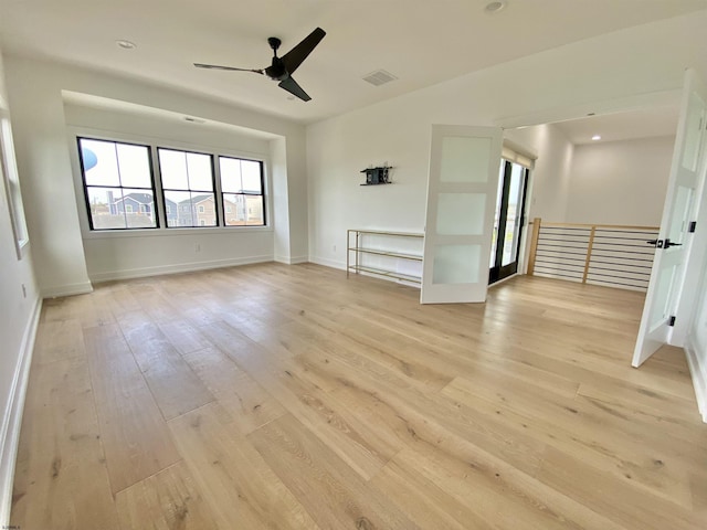 116 Bayshore Ave, Brigantine, NJ 08203 - spare room featuring a ceiling fan, light wood-style floors, and baseboards
