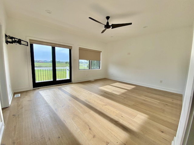 116 Bayshore Ave, Brigantine, NJ 08203 - unfurnished room with baseboards, light wood finished floors, and a ceiling fan