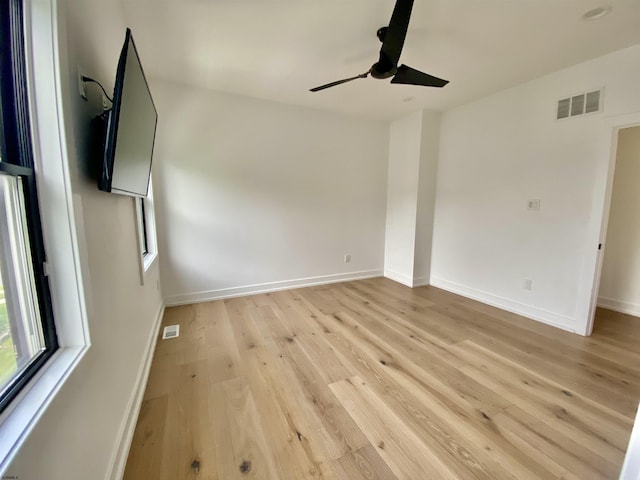 116 Bayshore Ave, Brigantine, NJ 08203 - spare room featuring a ceiling fan, light wood finished floors, and baseboards