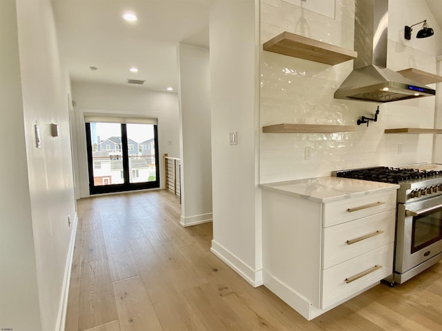 116 Bayshore Ave, Brigantine, NJ 08203 - kitchen with stainless steel range, wall chimney exhaust hood, baseboards, backsplash, and open shelves