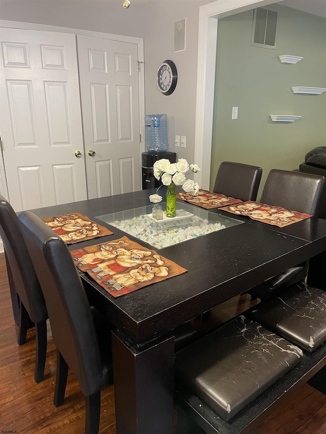 dining room featuring dark wood-type flooring