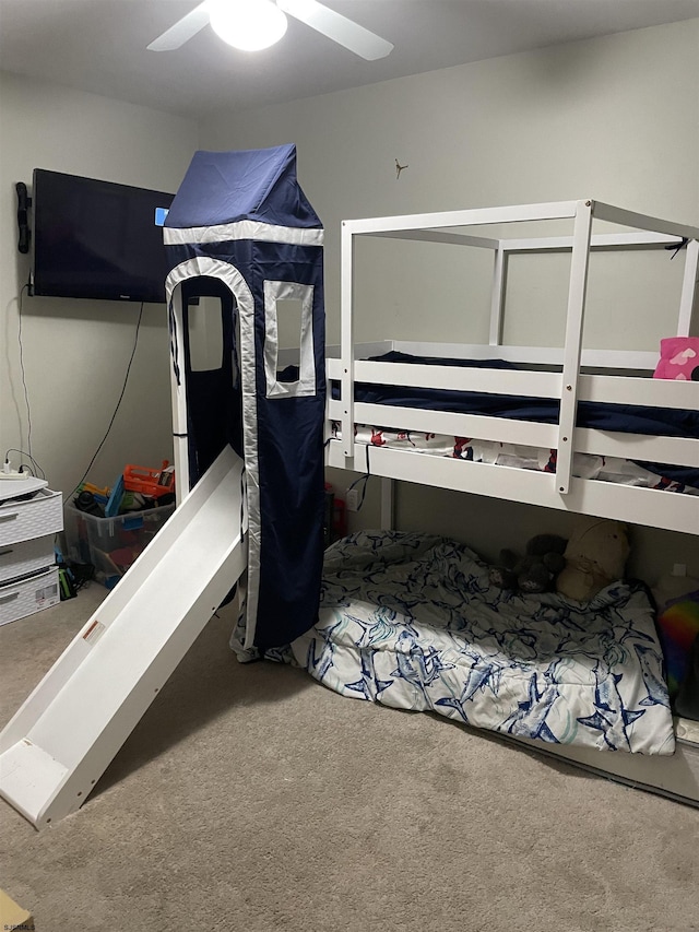 bedroom with carpet and a ceiling fan