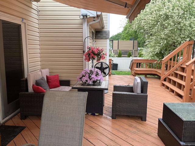 deck featuring stairway