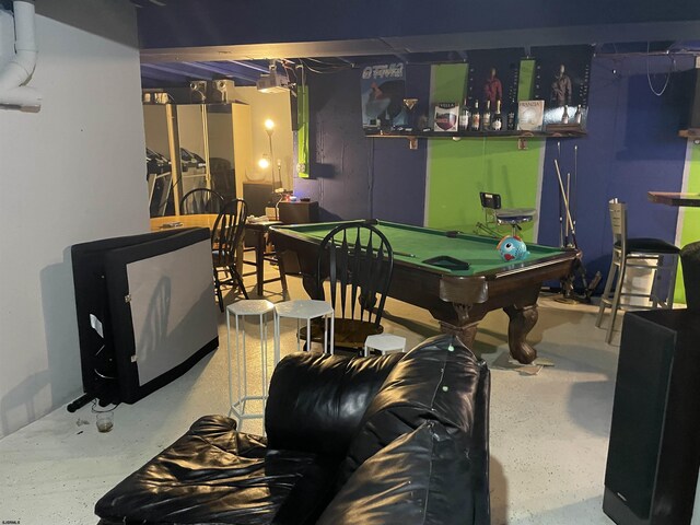 playroom with finished concrete flooring and billiards