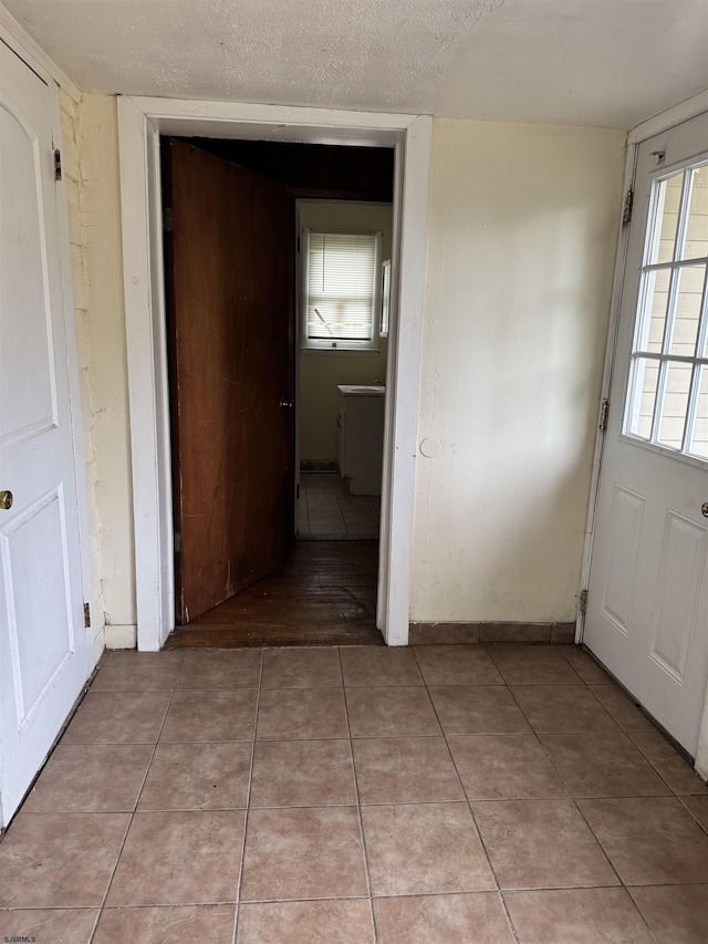 224 Linden Ave, Pleasantville, NJ 08232 - doorway featuring light tile patterned flooring and a textured ceiling