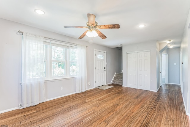 foyer with baseboards, recessed lighting, a ceiling fan, and wood finished floors