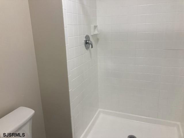 120 Heathercroft Unit 120, Egg Harbor Township, NJ 08234 - bathroom featuring a shower stall and toilet