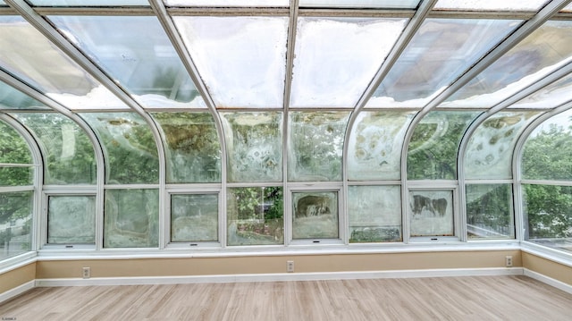 25 N Aberdeen Pl, Atlantic City, NJ 08401 - unfurnished sunroom with baseboards and wood finished floors