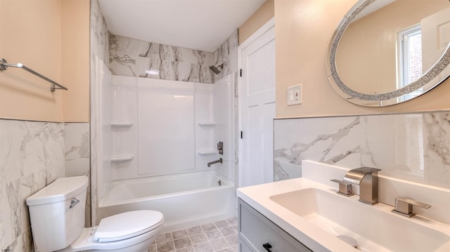 25 N Aberdeen Pl, Atlantic City, NJ 08401 - bathroom featuring toilet, tile walls, vanity, bathtub / shower combination, and wainscoting