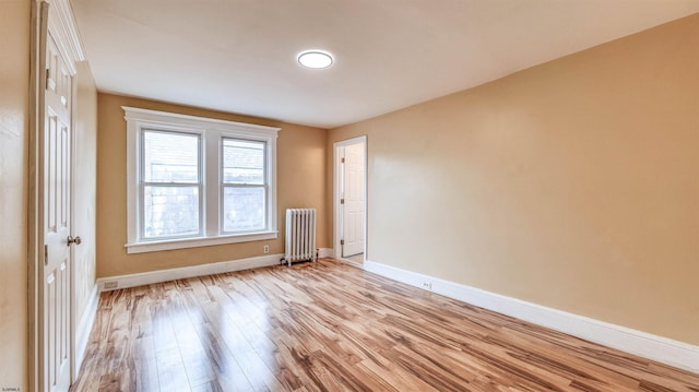 25 N Aberdeen Pl, Atlantic City, NJ 08401 - spare room featuring radiator, light wood-type flooring, and baseboards