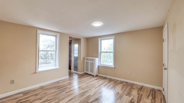 25 N Aberdeen Pl, Atlantic City, NJ 08401 - spare room with light wood-style floors, radiator heating unit, and baseboards