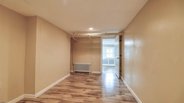 25 N Aberdeen Pl, Atlantic City, NJ 08401 - spare room with radiator, light wood-style flooring, baseboards, and recessed lighting