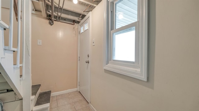 25 N Aberdeen Pl, Atlantic City, NJ 08401 - hallway with stairs, light tile patterned flooring, and baseboards