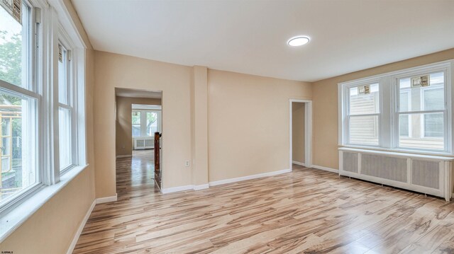 25 N Aberdeen Pl, Atlantic City, NJ 08401 - unfurnished room featuring radiator, light wood-style flooring, and baseboards