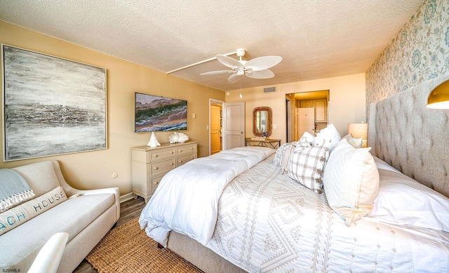 500 Bay Ave Unit 406S, Ocean City, NJ 08226 - bedroom with wood finished floors, a ceiling fan, a textured ceiling, and baseboards