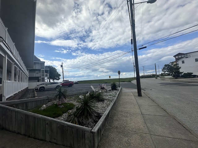 1203 E Beach Ave Unit 4, Brigantine, NJ 08203 - view of asphalt street with sidewalks and street lighting
