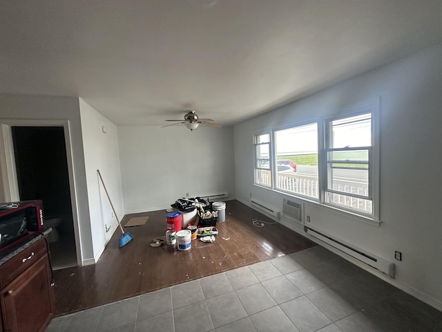 1203 E Beach Ave Unit 4, Brigantine, NJ 08203 - tiled spare room with ceiling fan, a baseboard radiator, and baseboards