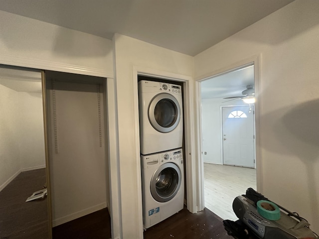 1203 E Beach Ave Unit 4, Brigantine, NJ 08203 - washroom with stacked washer / drying machine and dark wood-style flooring