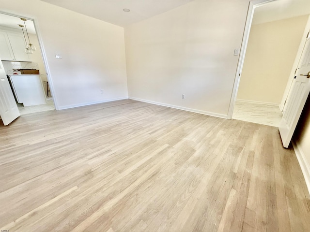 25 Wilson, Northfield, NJ 08225 - spare room with light wood-style flooring and baseboards