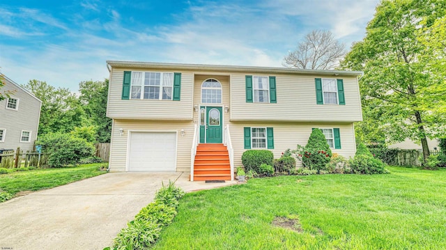 921 Navajo Ave, Absecon, NJ 08201 - split foyer home with concrete driveway and a garage