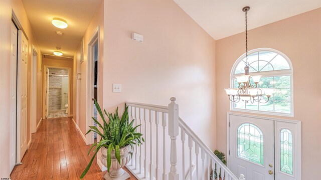 921 Navajo Ave, Absecon, NJ 08201 - entrance foyer with a chandelier, high vaulted ceiling, light wood-style flooring, and baseboards