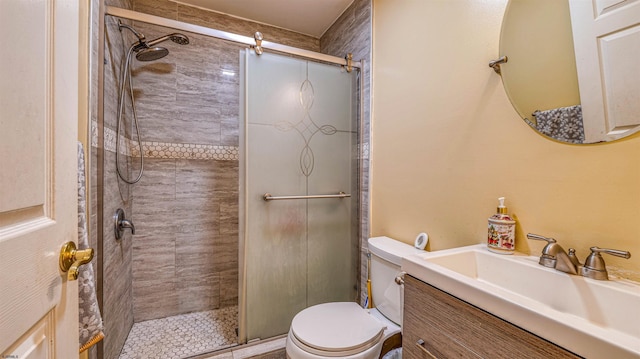 921 Navajo Ave, Absecon, NJ 08201 - bathroom featuring a stall shower, toilet, and vanity