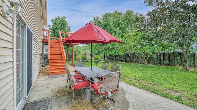 921 Navajo Ave, Absecon, NJ 08201 - view of patio with outdoor dining space, stairway, and a deck