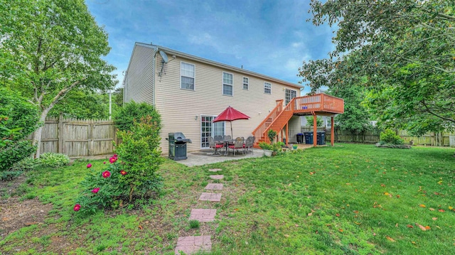 921 Navajo Ave, Absecon, NJ 08201 - rear view of house featuring a wooden deck, a patio, and stairway