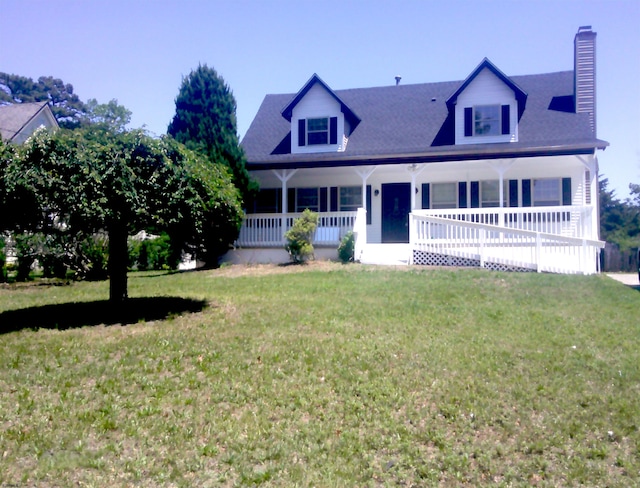 414A Upas Ave, Galloway Township, NJ 08205 - view of front of property with a porch, a chimney, and a front lawn