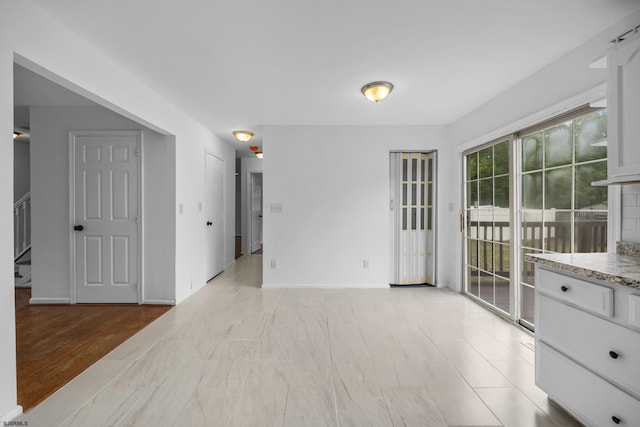 414A Upas Ave, Galloway Township, NJ 08205 - empty room with stairs and baseboards