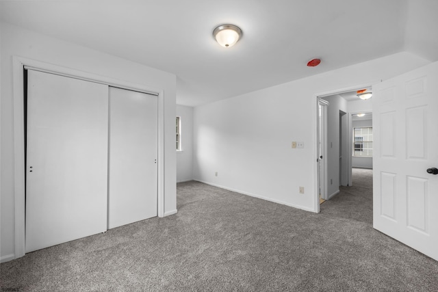 414A Upas Ave, Galloway Township, NJ 08205 - unfurnished bedroom with carpet floors, multiple windows, and a closet