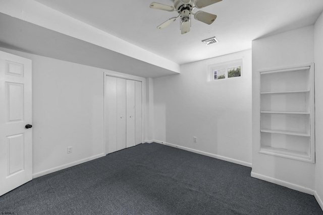 414A Upas Ave, Galloway Township, NJ 08205 - unfurnished bedroom with dark carpet, baseboards, and a closet